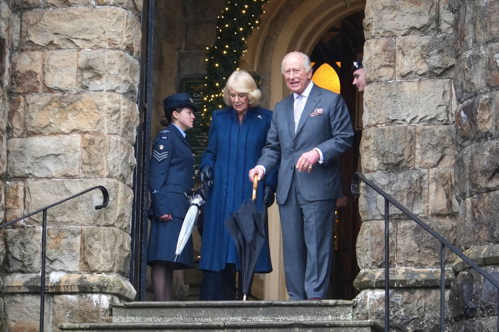 Their Majesties the King and Queen walking down the steps of Cyfarthfa Castle.jpg