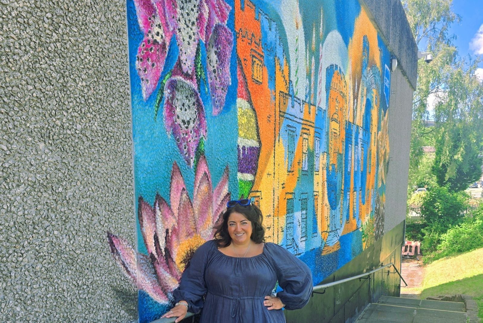 CEO Jess Mahoney stood in front of a colourful mural celebrating Cyfarthfa.jpg CEO Jess Mahoney stood in front of a colourful mural celebrating Cyfarthfa.jpg